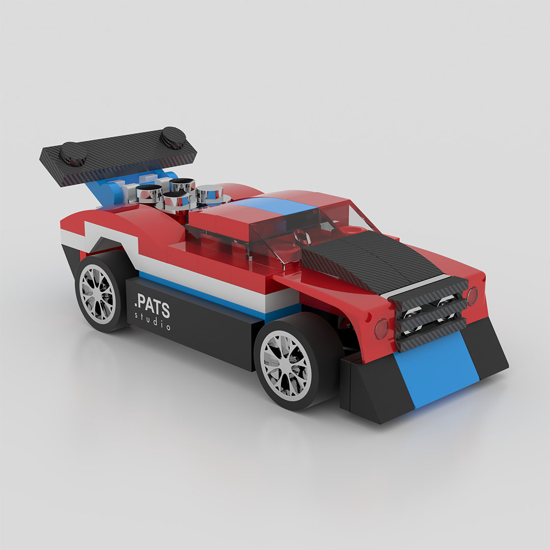 Car model in glossy red, white and blue plastic